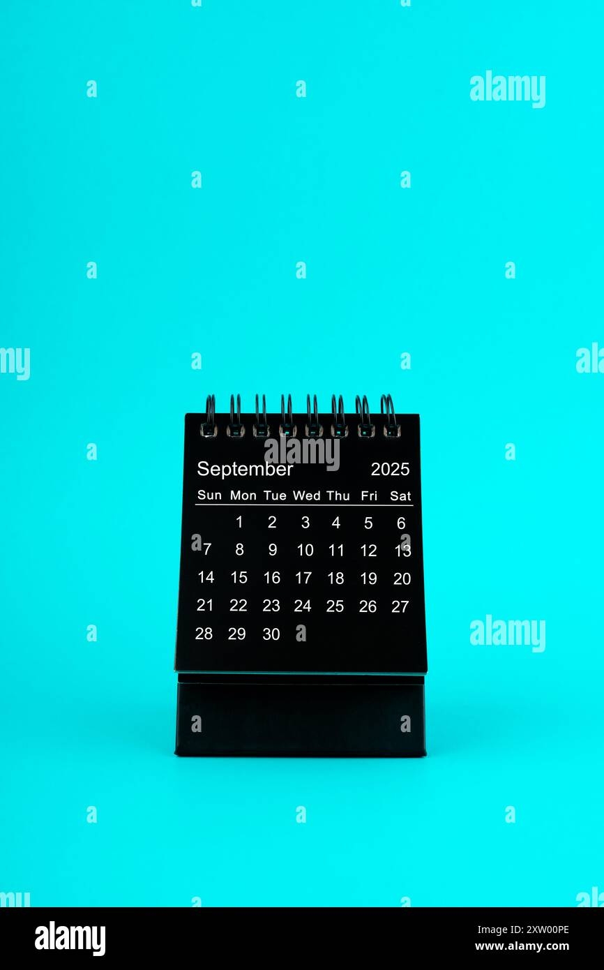 Black Calendar For September 2025 Desktop Calendar On A Green Color Background Stock Photo Alamy